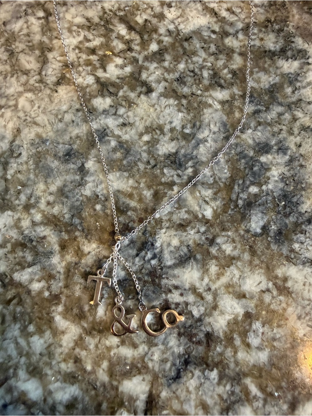 Tiffany & Co. Silver Dangle Initial, Ampersand & Circle Necklace